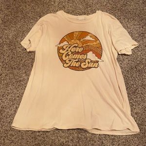 Cream colored altered state T-shirt